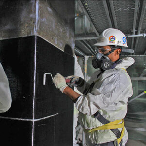 Can FRP be used to repair water-damaged reinforced concrete beams and girders in a parking garage where the slab supported by the beams and girders is also a parking area?